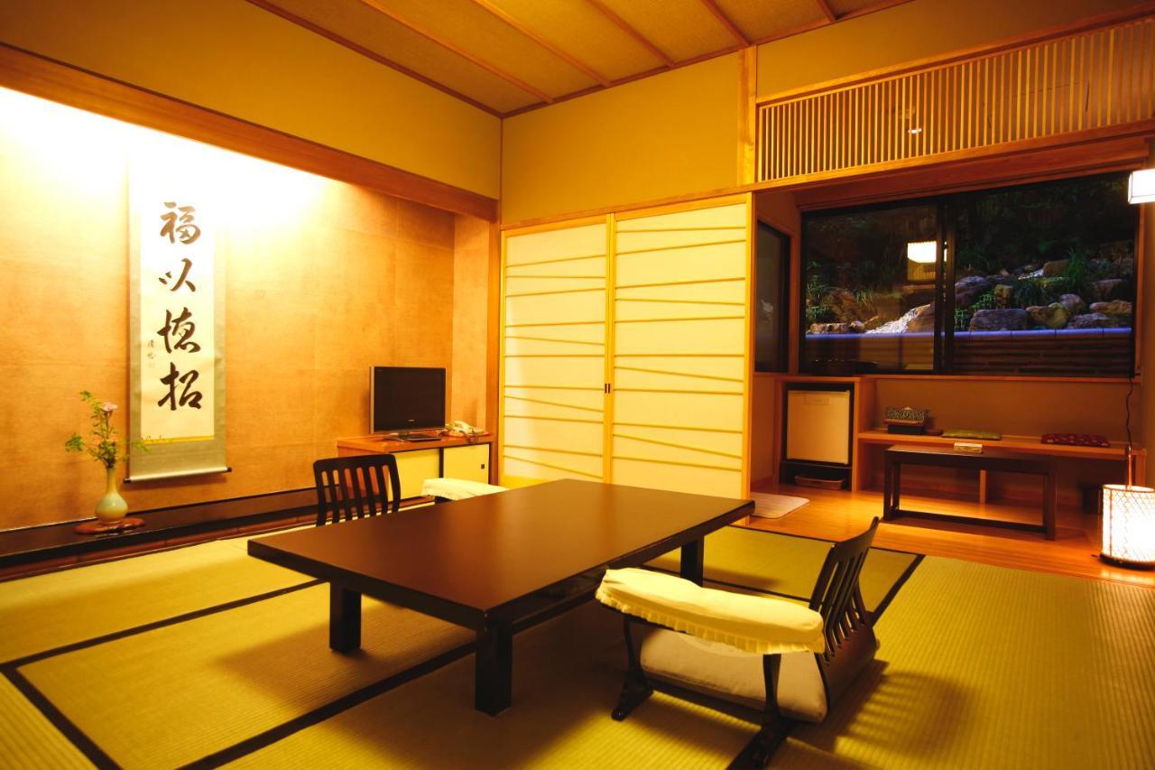 Kyoto Arashiyama Onsen Ryokan Togetsutei Экстерьер фото