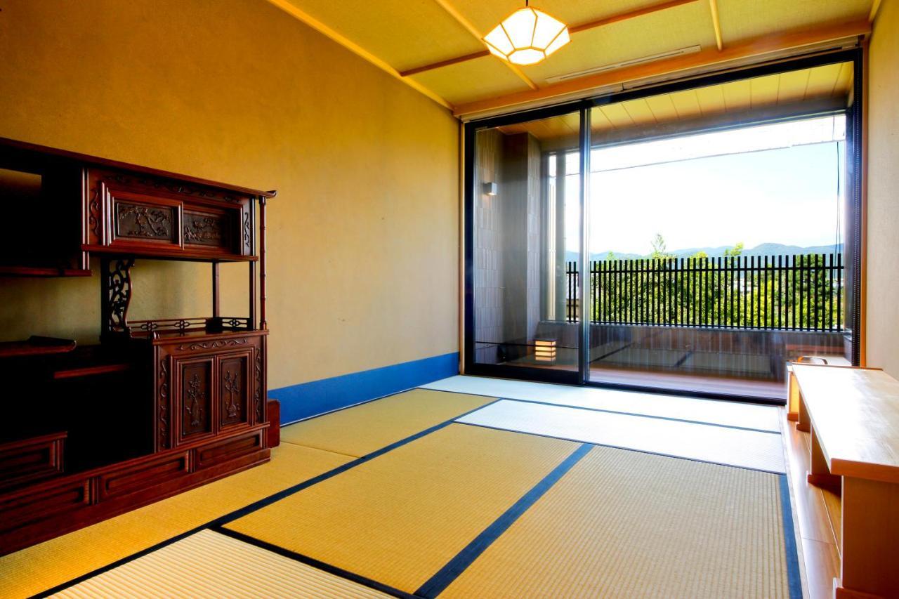 Kyoto Arashiyama Onsen Ryokan Togetsutei Экстерьер фото